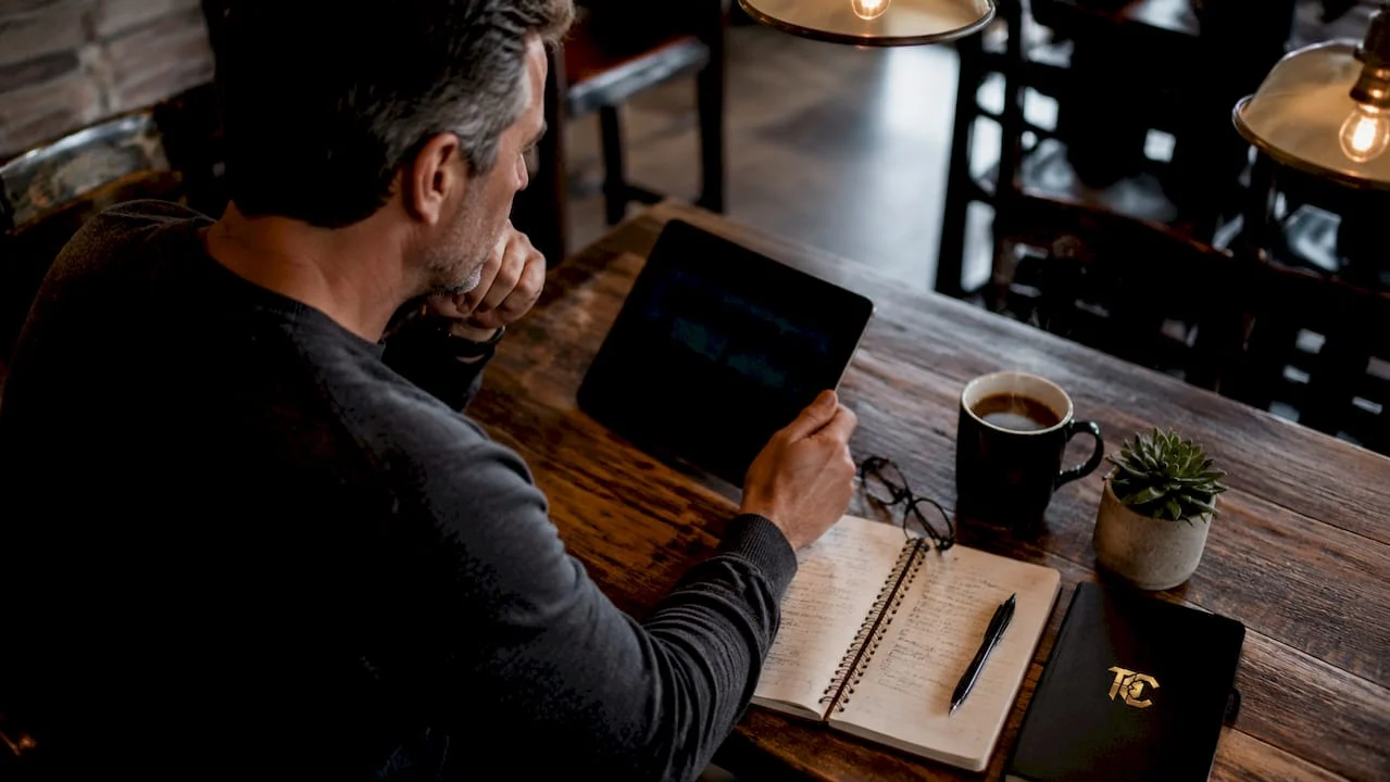 Man browsing firearm and tactical gear shops online