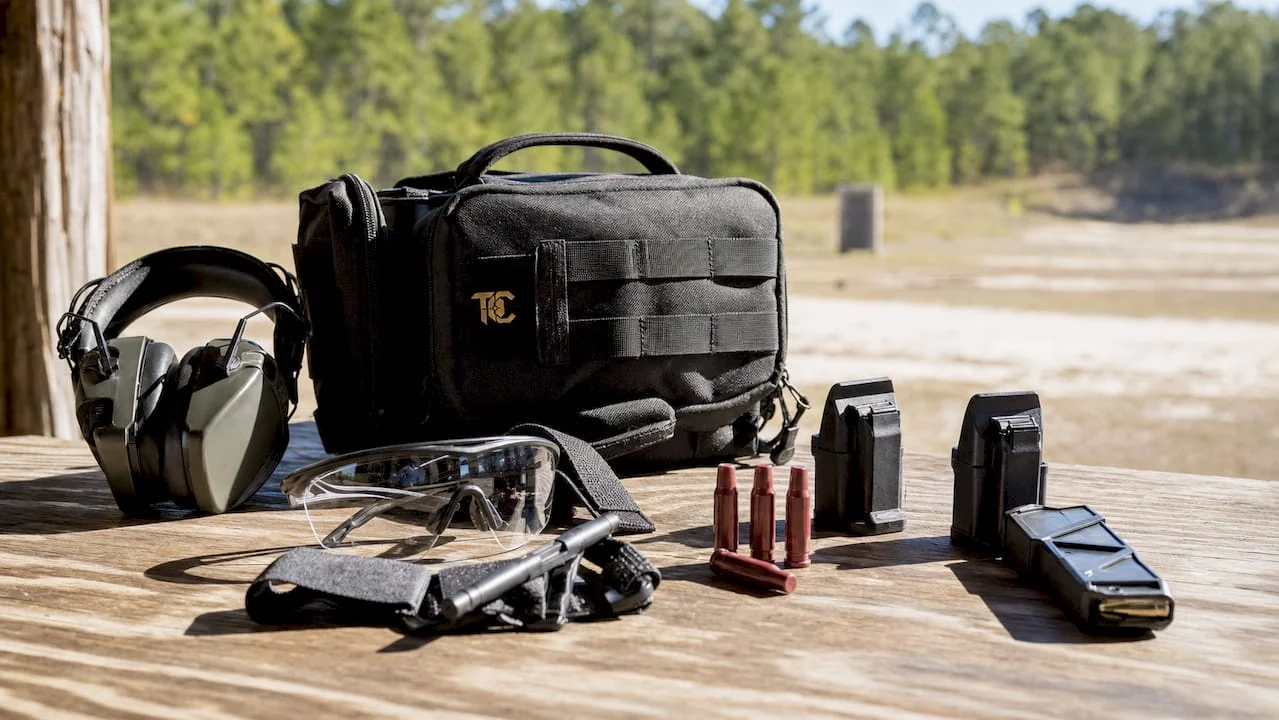 Organized shooting range accessories on table